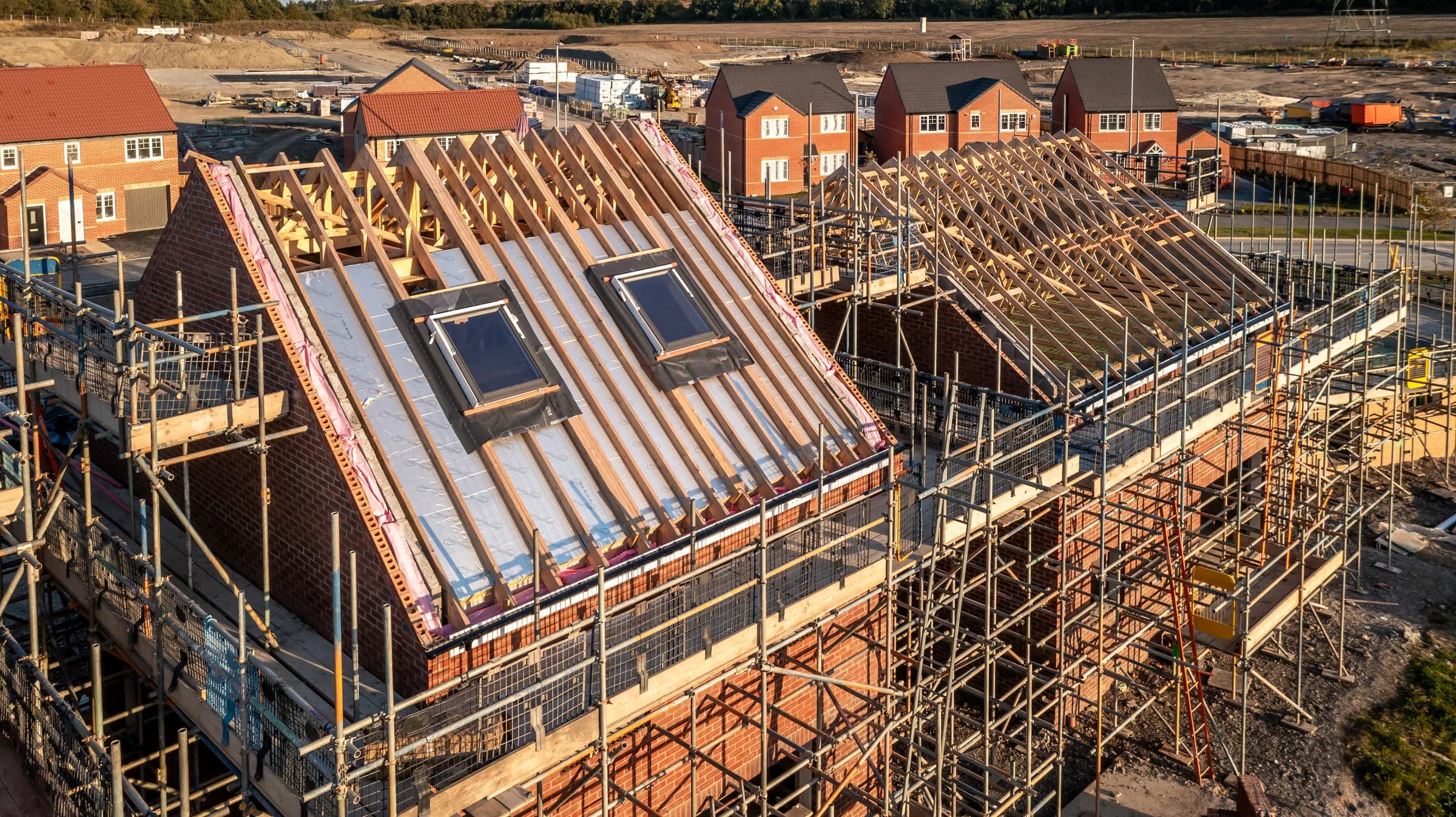 New clay tiled roof with scaffolding